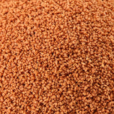 Close-up of 1mm floating Ocean Nutrition Atison's Betta PRO pellets