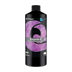 Quantum Reef Essential Aragonite C 500ml bottle for strontium and trace element supplementation in reef aquariums.