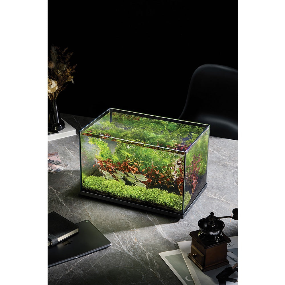 Angled view of the WYLD Scaper Forma Aquarium 27L highlighting polished edges and compact proportions