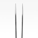 Close-up of needle-fine 1 mm tip on stainless steel forceps