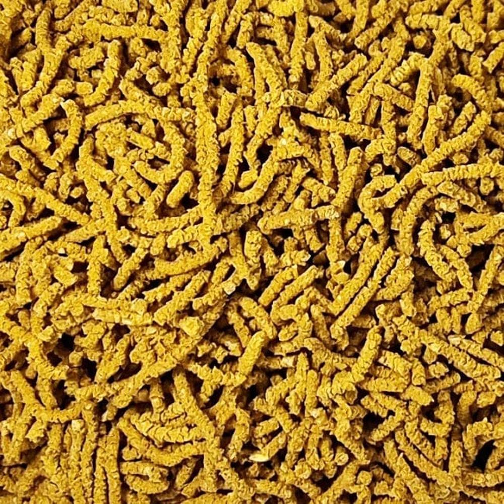 Yellow shrimp food pellets made from bee pollen and pumpkin