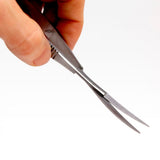 Close-up of curved blade and spring mechanism on Aquavitro shears